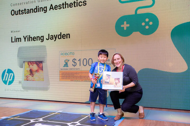 CodeFest Outstanding Aesthetics award winner with trophy