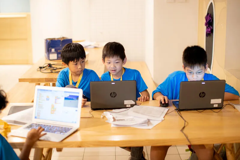 Three young coders